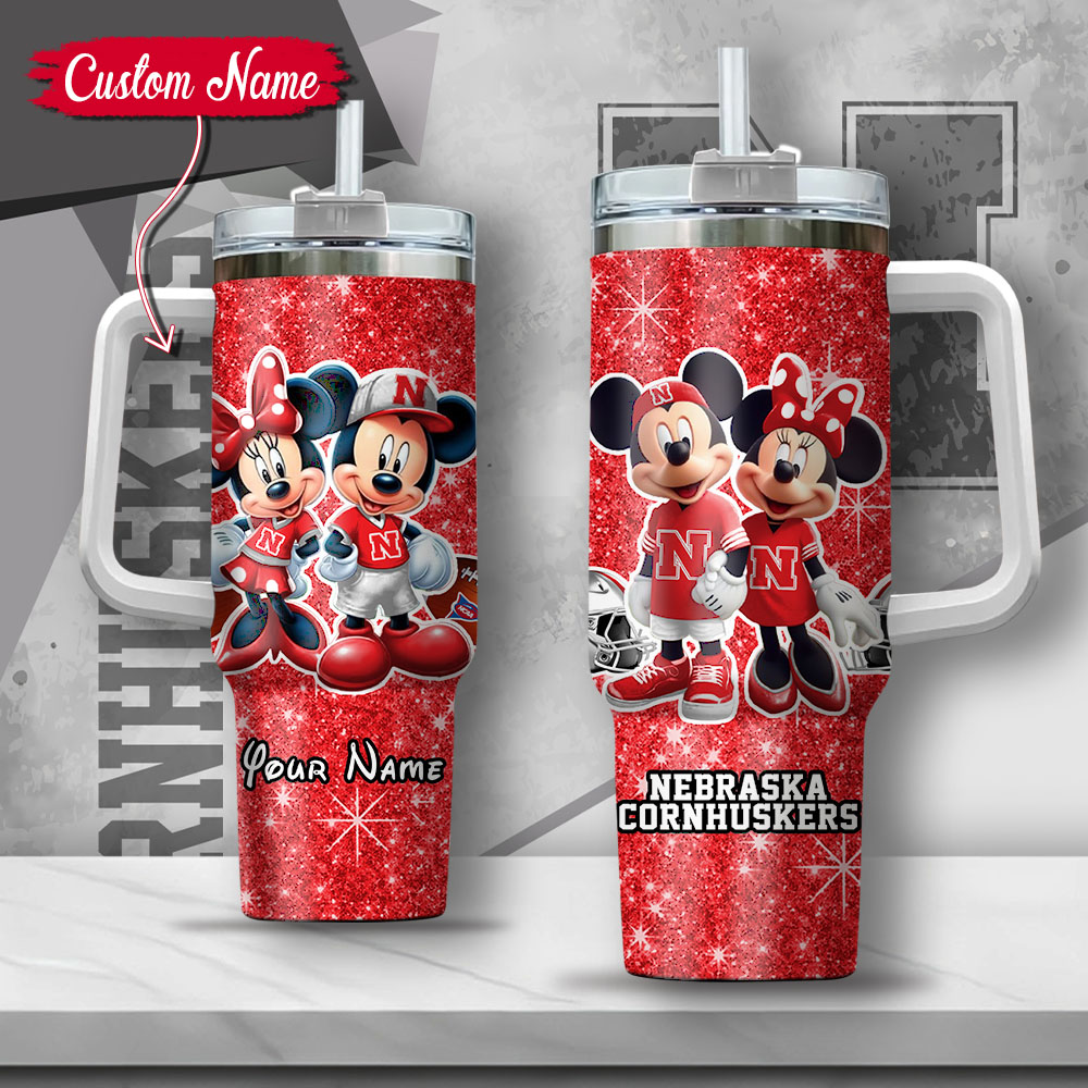 NCAA Nebraska Cornhuskers Mickey And Minnie Couple Custom Stanley Quencher 40oz Stainless Steel Tumbler With Handle